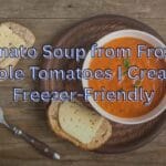 If you happen to have a freezer full of bags of frozen whole tomatoes, you are about 10 minutes away from the best damn homemade tomato soup that tastes like it’s been sitting on the stove all day, only after your frozen self slogged through the grocery store aisles for canned ones. This easy recipe is going to show you exactly how to make tomato soup from frozen whole tomatoes on the stove and Instant Pot with or without cream, dairy-free swaps AND a roasted-from-frozen flavor boost! You’ll find freezer meal prep tips, troubleshooting fixes, toppings, serving ideas and — of course — FAQs: Everything you need for a weeknight win. Why Frozen Whole Tomatoes Are a Great Idea What to do with frozen tomatoes: Frozen tomatoes are ideal for soup: The skins melt right off when heated, no blanching required. Ruptured cell walls/soft tomatoes: When you freeze tomatoes, it bursts their cell walls and they become almost soft very quickly — and so flavorful. They’re picked ripe and then frozen — perfect for off season soup that has great taste unlike most winter fresh tomatoes. Long-tail keywords to keep in mind and cherish as you read, cook: How (in the world) to make tomato soup from frozen tomato whole tomatoes Best tomato soup using frozen tomatoes Freezer friendly—and creamy!—tomato soup without cream Key Ingredients and Smart Swaps 3 pounds whole frozen tomatoes, such as Damsels (remove stems before freezing if you can). Onion: 1 medium, diced. Carrot: 1 medium, chopped (natural sweetness is more adventurous than sugar). Garlic: 3 cloves, minced. Olive oil or butter: 2 tablespoons. Broth: 2 to 3 cups low-sodium chicken or vegetable broth, plus more if needed for consistency. Tomato paste: 2 tablespoons, at once to supply umami and color. Seasoning: 1.25 to start, then taste (tsp kosher salt); 0.5 tsp black pepper. Herbs: 1 teaspoon dried basil or Italian seasoning, or a small handful of fresh basil at the end. Creaminess (choose your own adventure): 1/2 to 3/4 cup heavy cream/half and half/full-fat canned coconut milk, or 1 cup rinsed white beans for thickening (if going dairy free). Acid balance: 1 to 2 teaspoons sherry vinegar, red wine vinegar or lemon juice, to brighten in the end. Optional boosters: 1 roasted red pepper for sweetness and depth. 1 teaspoon smoked paprika, for a subtle campfire taste. 1 teaspoon fish sauce, or 1 anchovy (dissolved in oil), for savory umami; optional if vegetarian is a requirement. Recipe 1: Stove Top Classic Tomato Soup from Frozen Whole Tomatoes Serves: 4 to 6 Ingredients 3 lb frozen whole tomatoes 2 tbsp olive oil or butter 1 medium onion, diced 1 medium carrot, diced 3 cloves garlic, minced 2 tbsp tomato paste 2.5 cups low-sodium broth, or more as needed 1 teaspoon basil (or 1/2 cup fresh leaves at the finish line) 1.25 tsp kosher salt, or more to taste 0.5 tsp black pepper 1/2 to 3/4 cup heavy cream or coconut milk, or 1 cup white beans I to 2 tsp vinegar or lemon juice, as necessary, to taste Instructions Step 1: Sauté aromatics — Heat oil in a large pot over medium. Add onion and carrot. Transfer the eggplant to the flour on the baking sheet and cook 6 to 8 minutes, until tender and just golden. NOTE: May add slight amount of minced garlic, and cook 30 seconds. Step 2: To make the build base: Mix in tomato paste and cook for 1 minute until dark. Step 3: Pour in the frozen whole tomatoes and 2 cups of broth. Side note: Cover, reduce heat to medium-low and cook 15 minutes, stirring and breaking up tomatoes as they thaw. Step 4: Skinslips: With tongs, remove loosened skins from tomatoes and discard. If any are left, that is ok, you will also mix. Step 5: Add the seasoning: dried basil, salt, and pepper, and simmer Simmer 10 minutes. Add more broth if too thick. Step 6: Blend: Take an immersion blender and blend until smooth and velvety. Or carefully blend in batches. Step 7: Make it smooth: Add cream, coconut milk, or white beans (for extra-smooth, then blend again). Heat 2 minutes. Step 8: Add some acidity: Remove from the heat, add a splash of vinegar or lemon juice. Season the same way you would for any stew — with salt, pepper, and vinegar or lemon juice to taste. Step 9: Garnish and serve hot with crispy sides. Step 10: Turn it into a meal: Serve alongside grilled cheese, garlic bread or a green salad. Recipe 2: Instant Pot Tomato Soup (from Frozen Whole Tomatoes) Serves: 4 to 6 Ingredients Same as Recipe 1 Instructions Sauté: While the Instant Pot is on, pressing on Sauté Add oil, onion, and carrot. Cook 5 minutes. Add garlic; cook 30 seconds. Add tomato paste; cook, stirring, 1 minute. Pressure Cook: Set your pot to "load and pressure cook"; place frozen tomatoes into your pot along with 2 cups broth as well as salt, pepper and dried basil. Seal. Pressure cook on high for 8 minutes; natural release 5 min, then quick release. Peel off skins and combine: If you think there are any skins left, gently remove them. Using an immersion blender, blend until smooth. Texture + Add Ins: Stir in crème, coconut milk or white beans (think of mixing it up if using beans). Add vinegar or lemon juice. Check seasoning and thin with broth to desired consistency. Flavour Booster Roast-From-Frozen (Optional but So Good!) For deeper, slightly smoky flavor: Heat oven to 450°F. Spread frozen whole tomatoes on a rimmed sheet pan and drizzle with 1 tablespoon olive oil and a pinch of salt. Transfer to oven; roast until edges are blistered and juices have reduced, 20 to 25 minutes. Continue with either version of the recipe, adding the roasted tomatoes and all pan juices to the pot. You can also roast onions and carrot (cut into quarters) together with the tomatoes to add sweetness. Toppings and Serving Ideas Something crispy: Croutons, smashed crackers, toasted breadcrumbs, and crispy chickpeas all provide crunch. Swirls of cream (or pesto, or basil oil, or Greek yogurt) for garnish. Cheese: shaved parmesan, cheddar, or mozzarella pearls. Fresh herbs: such as basil, chives or parsley. Sides: Tuna melt, grilled cheese, avocado toast or warm baguette. Variations You’ll Love Creamy tomato soup, dairy-free — swap out cream for full-fat coconut milk or white beans. Blend in 1 roasted red pepper for roasted red pepper tomato soup. Spicy tomato soup: Stir in 0.25 to 0.5 teaspoon red pepper flakes or a pinch of cayenne. Tomato basil bisque: Stir in 0.5 cup torn fresh basil and additional cream. Tomato soup with added protein: Puree 1 cup white beans into the soup (and stir in grated Parmesan). For a tomato tortellini soup, add cheese tortellini and let it simmer with the soup for 4 to 6 minutes before serving. Vodka sauce: Add 1 to 2 tablespoons vodka during the simmer to deepen aromatics, then finish with cream. For smoky chipotle tomato soup: add 0.5 to 1 chopped chipotle in adobo. Tomato Soup with Frozen or Fresh Tomatoes Factor Frozen Whole Tomatoes Fresh Tomatoes Convenience Ready year-round; no blanching Requires blanching to peel Flavor Deep, concentrated after simmering Best in peak season only Texture Softens quickly; easy to blend Can be watery off-season Prep Time Faster once thawing starts More prep if peeling Cost “bargain if you freeze in season” Higher out of season Cream Choices vs Non-Dairy Creaminess Option Texture Flavor Impact Notes Heavy cream Silky, rich Classic, neutral Add right before serving Half-and-half Lightly creamy Mild Lower calories than cream Coconut milk (full-fat) Lush, smooth Subtle coconut Great dairy-free option White beans (blended) Thick, hearty Neutral, savory High fiber/protein Greek yogurt Tangy, creamy Slight tang Cool slightly before removing from the heat to prevent clogging Batch-Freezing, Storage, and Reheating This recipe thrives with freezer meal planning. How to freeze Cool soup quickly. Pour into shallow dishes to cool more quickly. Divide into 1- to 2-cup portions, and use it for packable lunches. When filling containers, leave some headspace to allow for expansion. Label with name and date. Freeze for up to 3 months for best quality. Reheating Stovetop: Warm over medium, adding a splash of broth or water to thin. Microwave: Reheat in 30-second intervals, stirring between. From the freezer: Thaw overnight in the refrigerator or reheat gently (covered) from frozen. Food safety quick notes Chill quickly in shallow containers. Reheat to steaming-hot throughout. Avoid repeated thaw–refreeze cycles. Best containers for freezing Container Pros Cons Quart deli containers Stackable, reusable Can stain Glass jars (wide-mouth) Plastic-free, durable Allow for headspace to avoid cracking Freezer bags (flat) Space-saving Single-use for many kitchens Souper cubes/silicone trays Portion control Requires tray + bag Pro Tips and Troubleshooting Too acidic? Swirl in 1 to 2 teaspoons (or more) cream, coconut milk or a small pat of butter; or stir in some grated Parmesan. A smidgen of sugar or a bit of honey is nice, but try carrot first. Too sweet or flat? Then add 1 to 2 teaspoons vinegar or lemon juice along with a grind of pepper and more salt. Too thin? Simmer, uncovered, for 5 to 10 minutes. Or purée in 1/2 cup white beans for fiber and thickening. Too thick? When all is sautéed and boiling hot, add warm broth in small bits. Lacking depth? Stir in 1 teaspoon tomato paste, a spoonful of miso or a few drops of fish sauce or smoked paprika. Grainy texture? Puree longer or push through a fine-mesh strainer for a restaurant-smooth consistency. Skin bits bothersome? Remove as many as you can while the chiles simmer, then puree well. Make-Ahead and Meal Prep Make a double batch on Sunday and pack lunches for the week. Freeze half before adding the cream, then do so after reheating for richest texture. Prep “aromatic packs.” Pre-diced onion, carrot and garlic in freezer bags to dump-and-go with frozen tomatoes. Nutrition Snapshot (Per Serving) Per serving (based on 8, without chive and lemon garnish): With cream: approximately 180 to 230 calories, 12 to 18 grams fat, 4 to 6 grams protein, 16 to 22 grams carbohydrates. White beans, Dairy-free: around 150 to 190 calories, 4 to 6 grams fat, 7 to 10 grams protein, 22 to 26 g carbs. Specific values are provided for ingredients and portions. FAQs Q: Can I make tomato soup with frozen whole tomatoes instead of thawing them? A: Yes. Add them straight to the pot. As they simmer, they’ll thaw and begin to disintegrate. Peel away skins with tongs, lifting off. Q: Should I peel them? A: Not necessary, but taking most off helps to produce a finer texture. An immersion blender is useful if a few stubborn bits persist. Q: How can I prevent curdling when incorporating dairy? A: Turn down the heat and add cream toward the end. Never boil dairy after adding Add yogurt means Tempered first. Q: What broth is best? A: The low-sodium chicken broth provides a base of savory depth. Make it vegetarian tomato soup by using vegetable broth. Q: Can I use canned tomatoes instead of frozen ones? A: Yes. Toss in a 14.5-ounce can of (they have tomato and spices) for smokiness and body. Q: How long does homemade tomato soup keep in the fridge? A: Up to 4 days in a sealed container. Reheat until steaming-hot before serving. Q: How can I make this kid friendly? A: Sweeten with carrot, avoid the chile add-ins and end with a drizzle of cream and Parmesan. Conclusion Begin with frozen whole tomatoes and you’ll have quick, consistent tomato soup with peak-season flavor regardless of the season. Or use the stovetop or Instant Pot classic, attempt the roast-from-frozen upgrade and end with your favorite creamy or dairy-free option. Batch it, freeze it, and you’re 15 minutes from cozy bowls on demand. The best tomato soup from frozen tomatoes is simple, adaptable and totally weeknight-friendly.